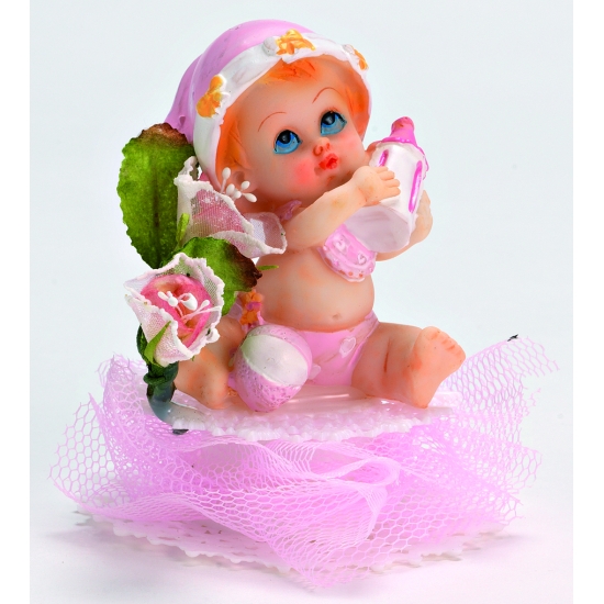 Bébé assis sur socle